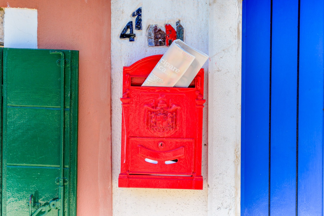 Red mailbox at Burano - Venice - Italy