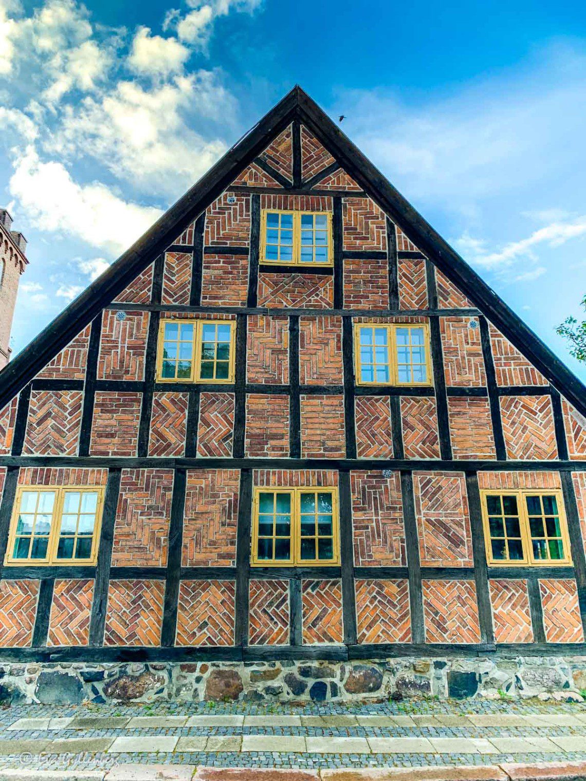 Tall half-timbered house with brick in Lund