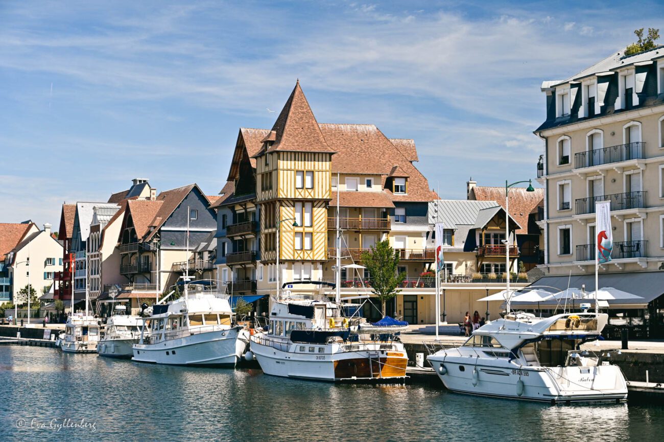 Boats are lined up in the canal in Deauville