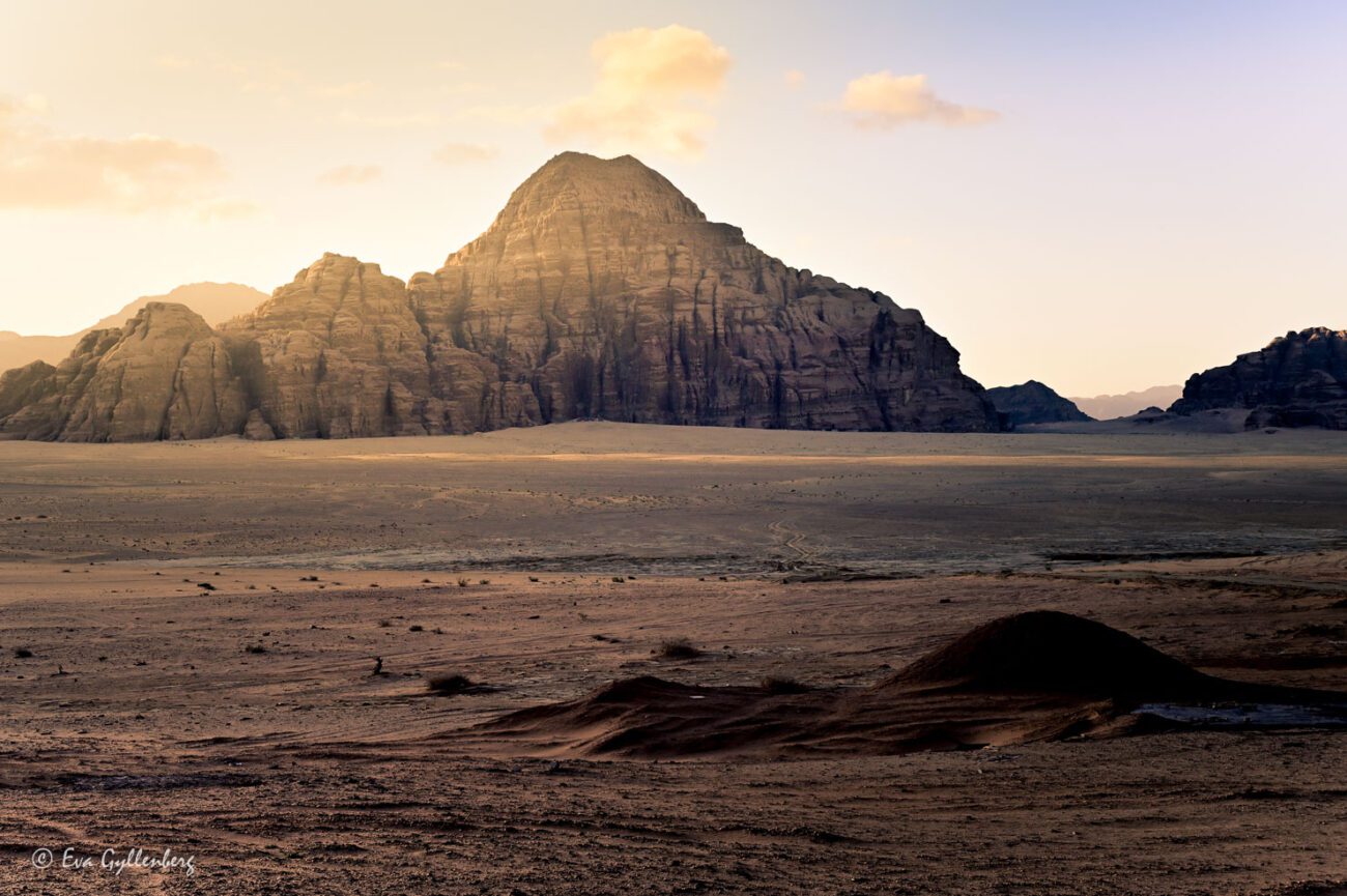 Desert cliffs in backlight at sunrise